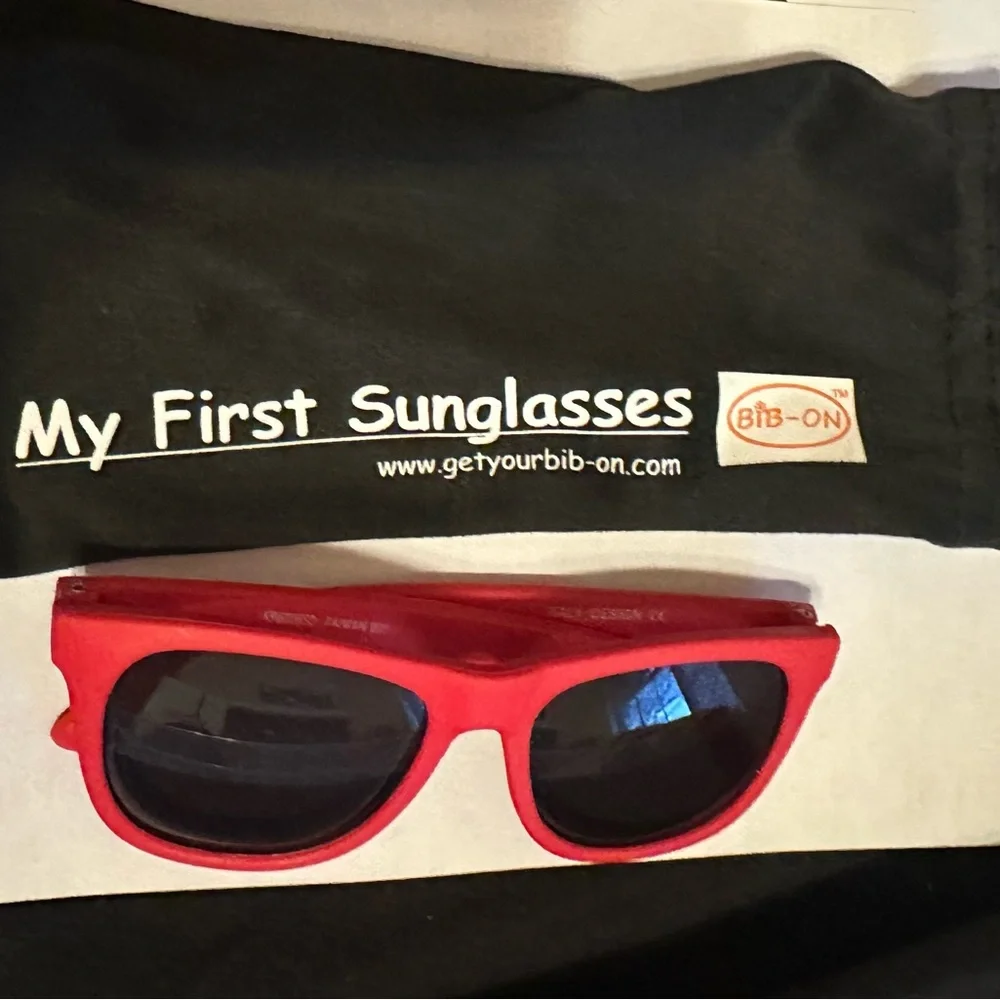 Vibrant Red Sunglasses with Dark Lenses for babies.
